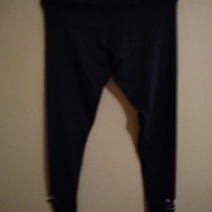 Cut out sports bra on side and cut out bottom legg